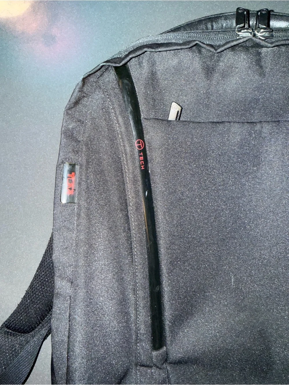 Tumi Black Tech Backpack with Subtle Red Accent